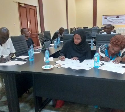 Members of Kisumu CEF filing in evaluation forms on the final day of Kisumu CAP